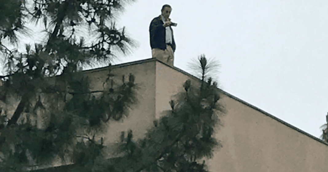 Darrell Issa Appears to Flee to Building Roof to Avoid Protesters